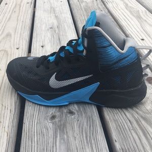 Blue and black basketball shoes